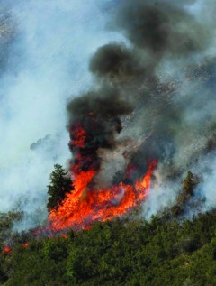 Wildfire: West cities ban fireworks; blazes grow
