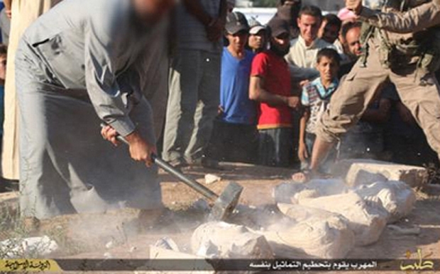 ISIS smashes priceless Palmyra artifacts in photos