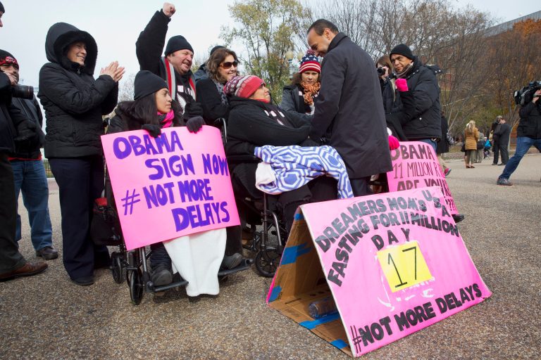 Rep. Luis Gutierrez, D-Ill., right, speaks with Lenka Mendoza of Dumfries, Va., who is originally from Peru and has two children who qualified for DACA, during a rally in front of the White House in Washington. (AP Photo)Â 