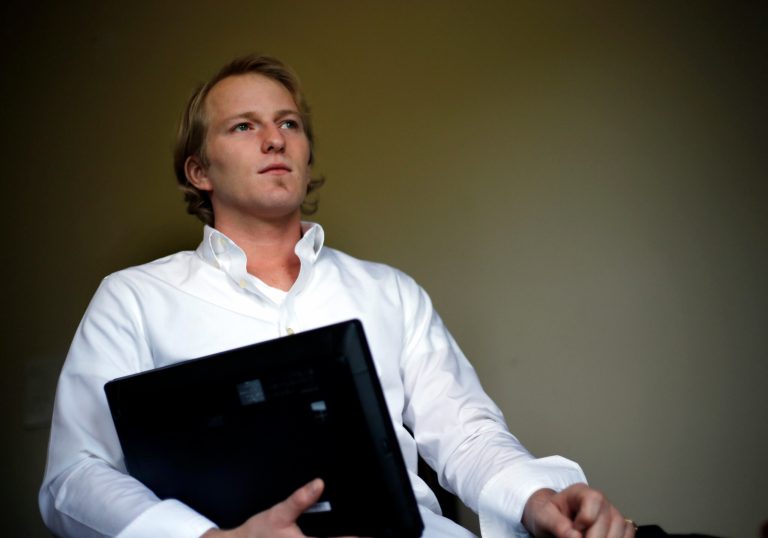David House poses with his laptop computer at his Somerville, Mass. home on Monday, Sept. 9, 2013. Newly disclosed U.S. government files provide an inside look at the Homeland Security DepartmentÃ?s practice of seizing and searching electronic devices at the border without showing reasonable suspicion of a crime or getting a judgeÃ?s approval. The documents describe the case of House, who had befriended Army Pvt. Chelsea Manning, the soldier convicted of giving classified documents to WikiLeaks. U.S. agents quietly waited for months for House to leave the country then seized his laptop, thumb drive, digital camera and cellphone when he re-entered the United States. (AP Photo/Elise Amendola)