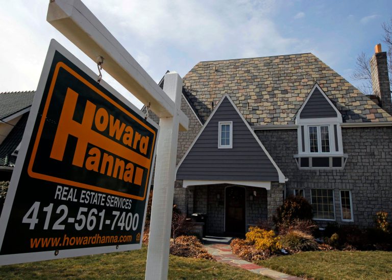 FILE - This March 5, 2013, file photo  shows a home for sale in Mt. Lebanon, Pa. Freddie Mac reports on mortgage rates for the last week of October on Thursday, Oct. 31, 2013. (AP Photo/Gene J. Puskar, File)