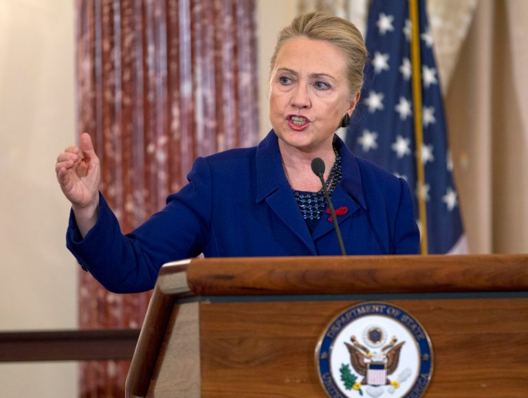   Secretary of State Hillary Rodham Clinton gestures as she speaks during a ceremony in recognition of World AIDS Day, Thursday, Nov. 29, 2012, at the State Department in Washington, where she released The U.S. President's Emergency Plan for AIDS Relief, (PEPFAR) Blueprint' for Creating an AIDS- Free Generation. (AP Photo/Jose Luis Magana)  