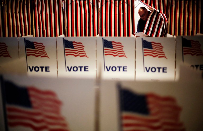 The Office of Personnel Management warned federal agencies this week not to give their employees too much time off to vote on Nov. 8. (AP Photo/David Goldman)