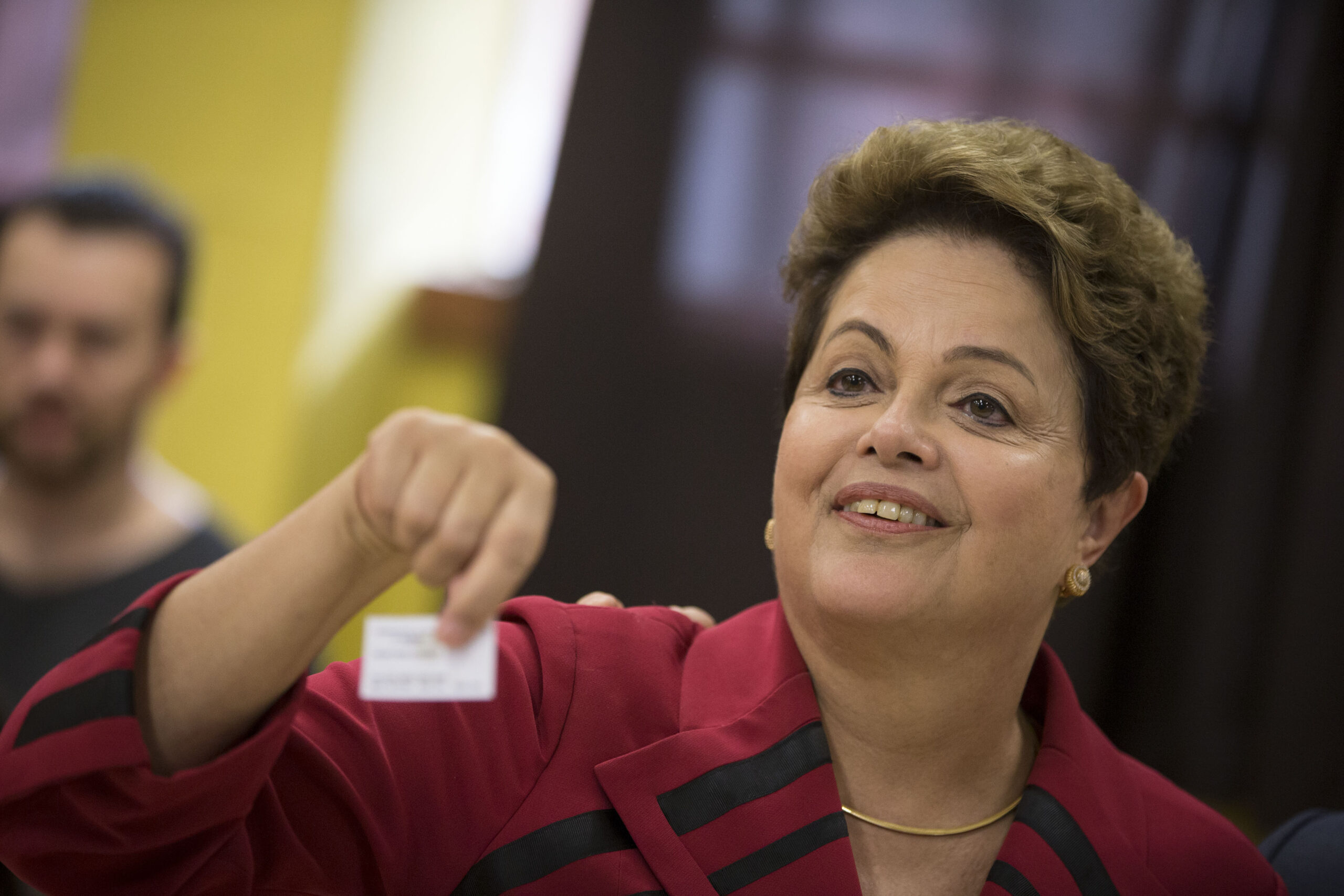 Brazil votes, heavily, but result in runoff looks unclear