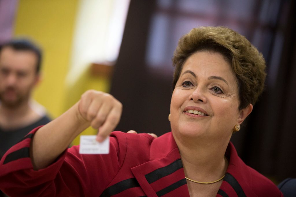 Brazil votes, heavily, but result in runoff looks unclear