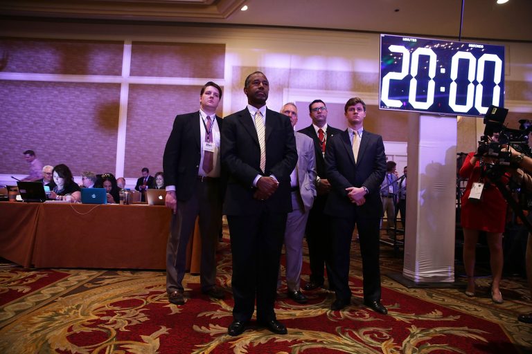 Republican U.S. presidential hopeful Ben Carson (C) waits to be introduced during the 'Road to Majority' conference June 19, 2015 in Washington, DC. (Photo by Alex Wong/Getty Images)