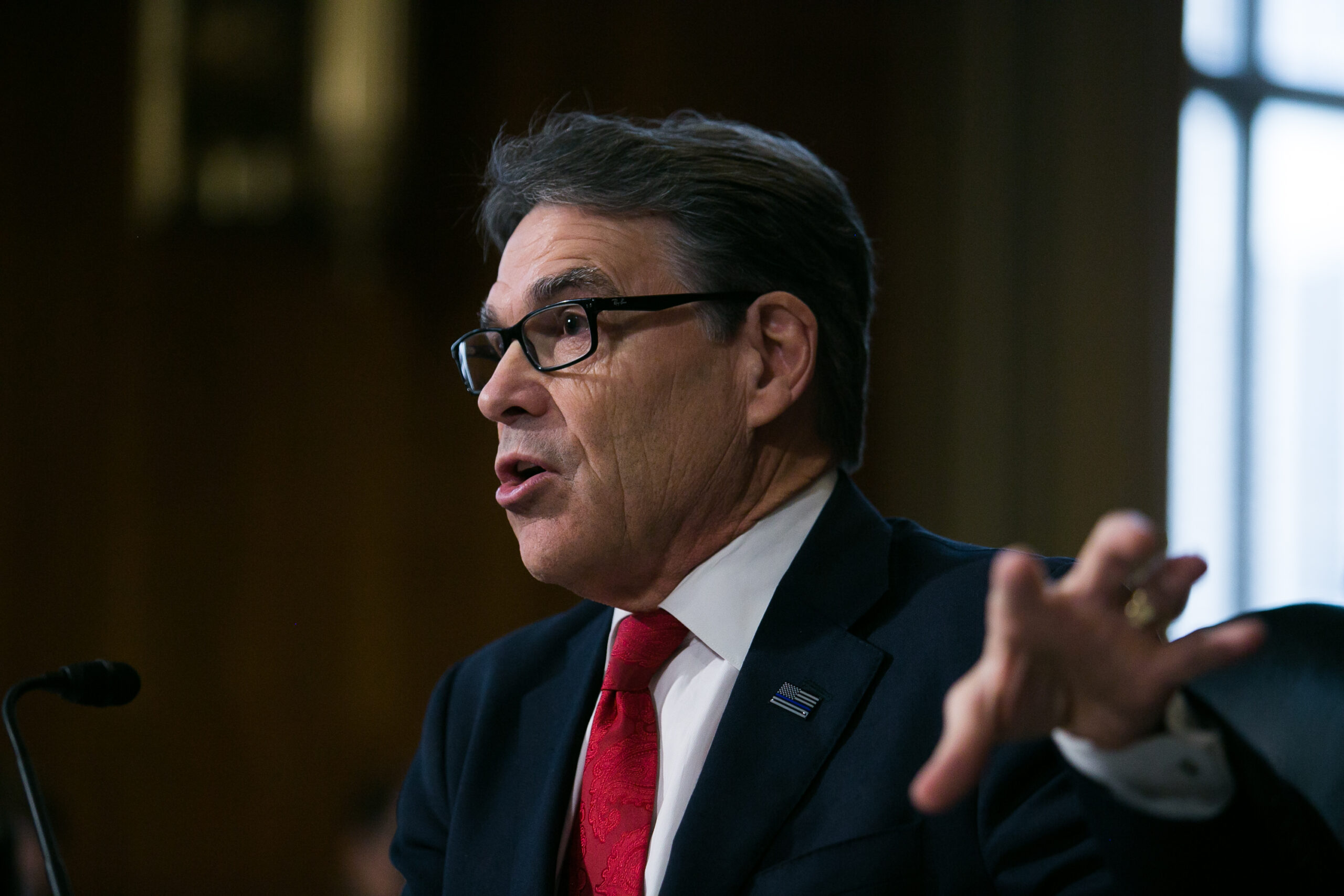 Rick Perry spars with Bernie Sanders over climate change