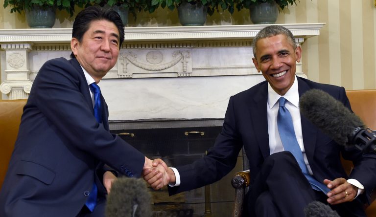 President Obama shakes hands with Japanese Prime Minister Shinzo Abe, Tuesday, April 28, 2015, in the Oval Office of the White House. (AP Photo/Susan Walsh)