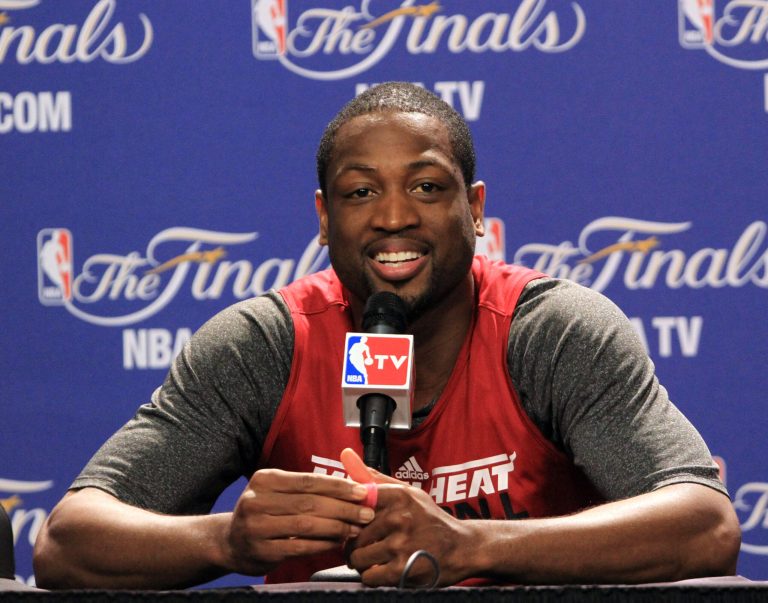   Miami Heat shooting guard Dwyane Wade reacts during a news conference Saturday, June 16, 2012, in Miami. The Heat play the Oklahoma City Thunder in Game 3 of the NBA basketball finals on Sunday. (AP Photo/Alan Diaz )  