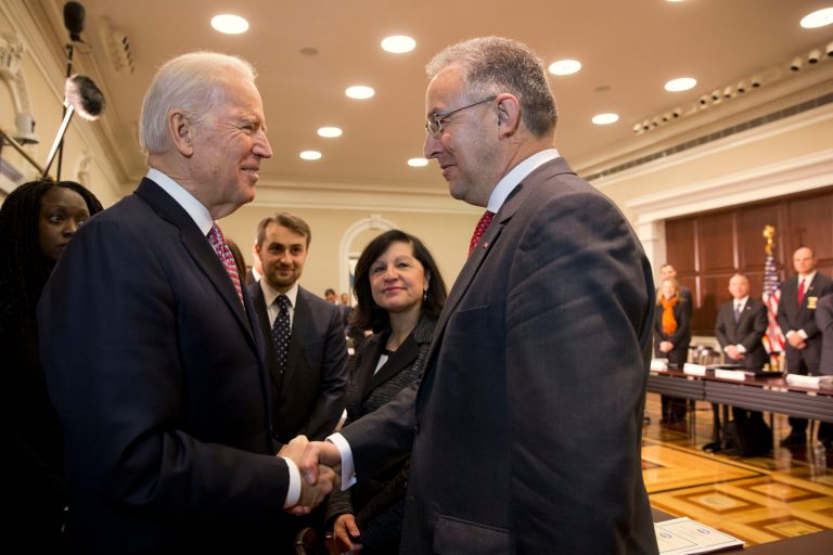 Vice President Joe Biden shakes hands with Rotterdam Mayor Ahmed Aboutaleb as the vice president arrives to speaks at a roundtable, part of the White House Summit on Countering Violent Extremism, Tuesday, Feb. 17, 2015, in the Eisenhower Executive Office Building on the White House Complex in Washington. (AP Photo/Jacquelyn Martin)
