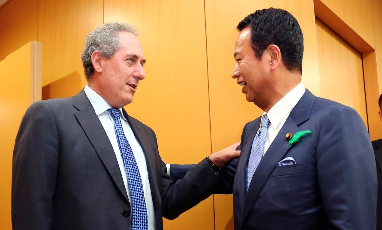 U.S. Trade Representative Michael Froman, left, speaks withÂ Japanese Economy Minister Akira Amari.Â 