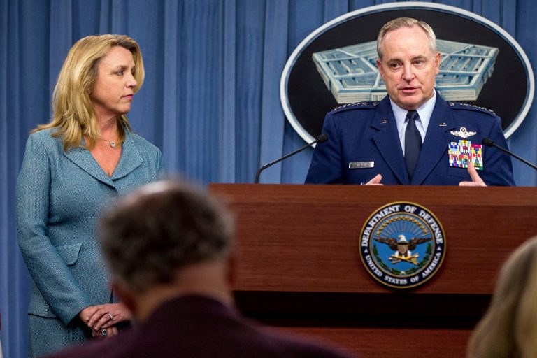 Air Force chief of staff, right, accompanied by Air Force secretary announcedÂ that Northrop Grumman is being awarded the US Air Force's next-generation long range strike bomber contract. (AP Photo/Andrew Harnik)
