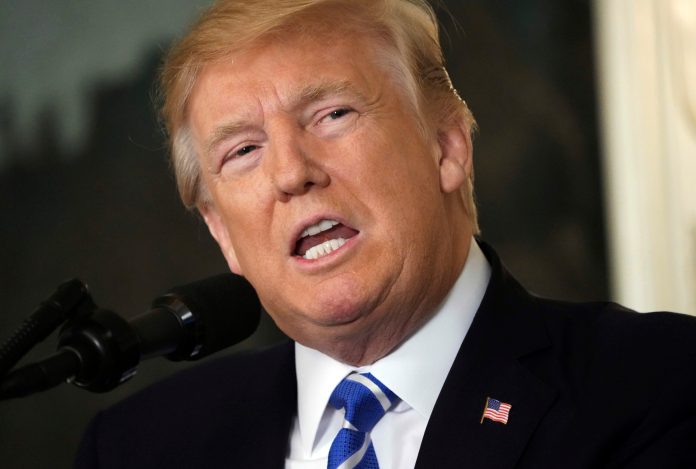 FILE - In this Nov. 15, 2017, file photo, President Donald Trump speaks in the Diplomatic Reception Room of the White House in Washington. Trump is expressing more doubts about a new policy allowing trophies of African elephants shot for sport to be imported. (AP Photo/Pablo Martinez Monsivais, File)