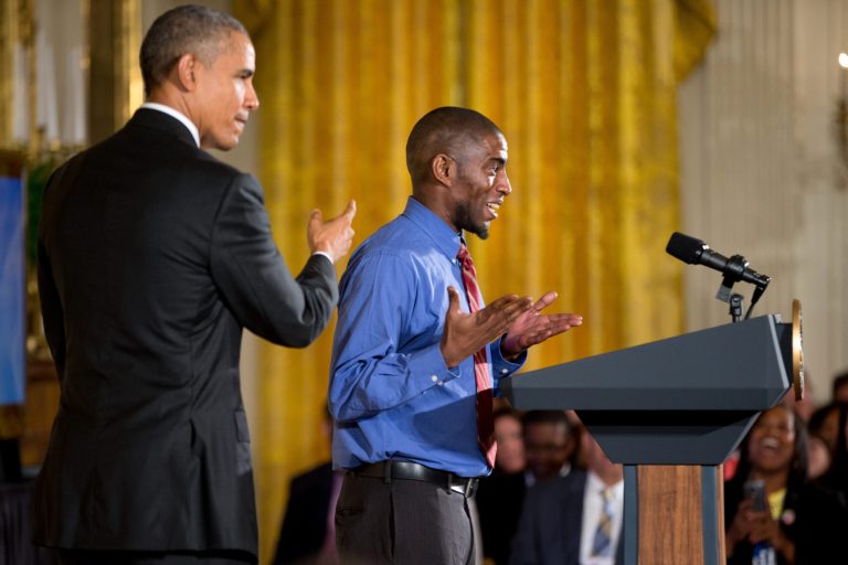 Terrence Wise, a second-generation fast food worker at McDonald's and Burger King in Kansas City, Mo., introduces President Obama during the White House Summit on Worker Voice, Wednesday. (AP Photo/Andrew Harnik)