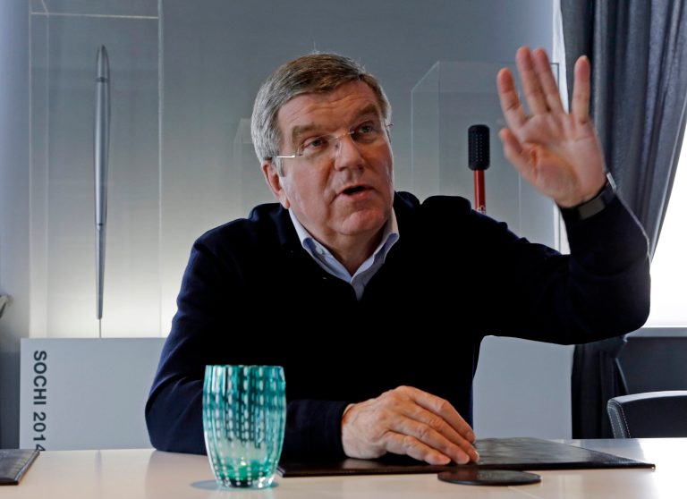 International Olympic Committee President Thomas Bach answers a question in his office during an Associated Press interview at the 2014 Winter Olympics, Saturday, Feb. 22, 2014, in Sochi, Russia. (AP Photo/Morry Gash)