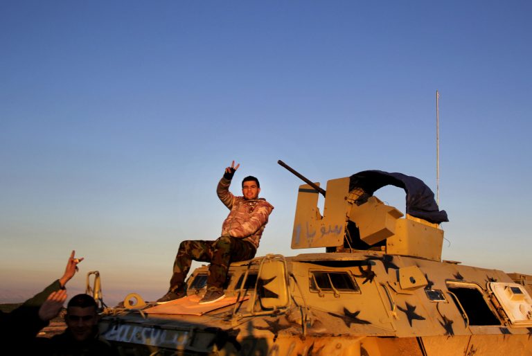 In this Tuesday, Jan. 20, 2015 image released by the Kurdistan Region Security Council (KRSC), Kurdish peshmerga forces prepare for battle against the Islamic State group, near the Mosul Dam, in Iraq. (AP Photo/Kurdistan Region Security Council)