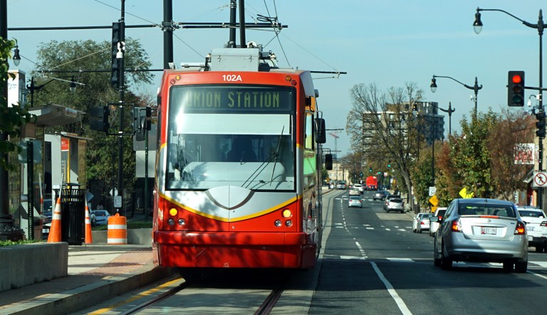 This is a picture of the D.C. Streetcar going down on H Street in Washington.