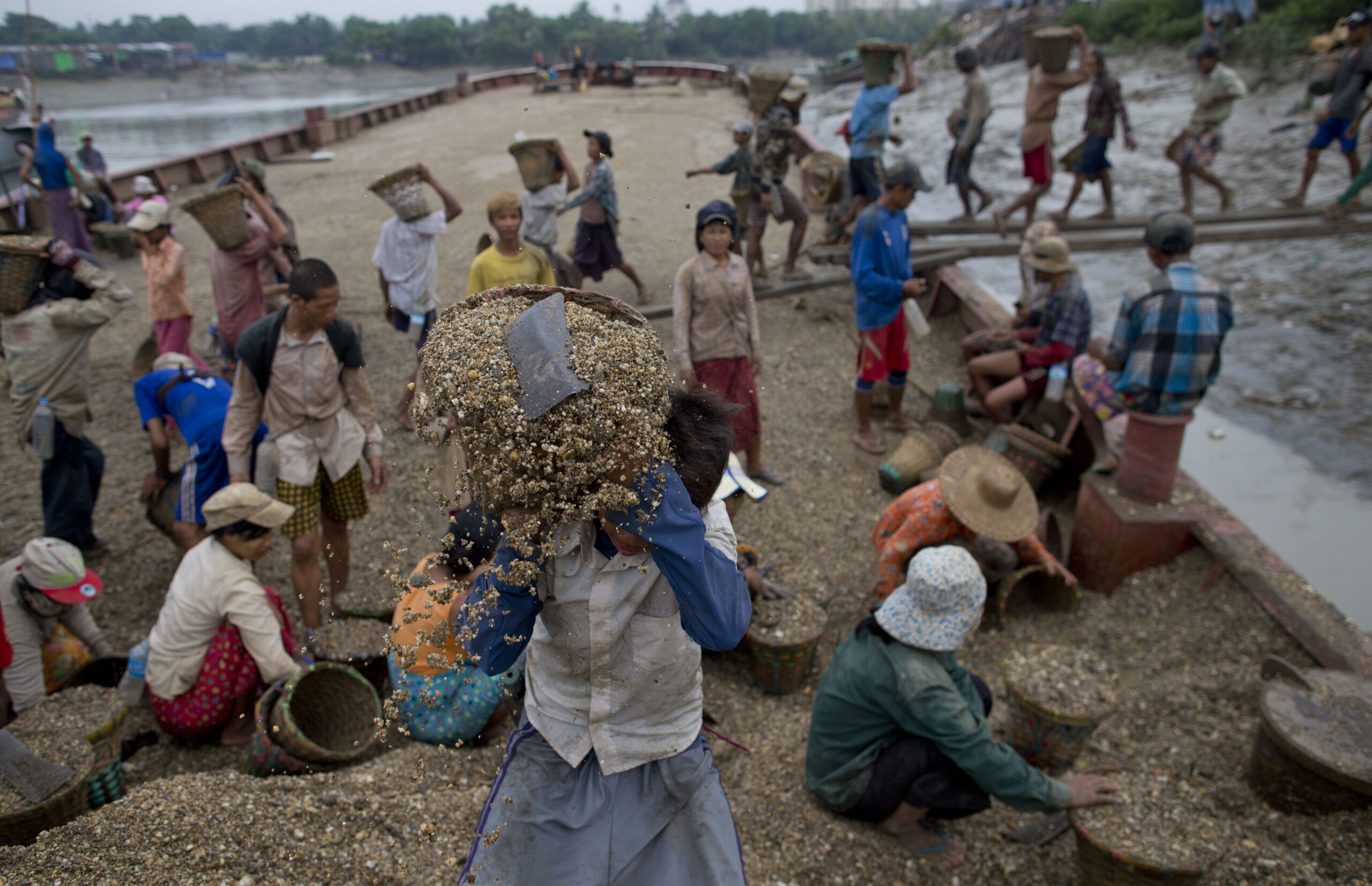 Hauling gravel: Daily toil for Myanmar boy, 11