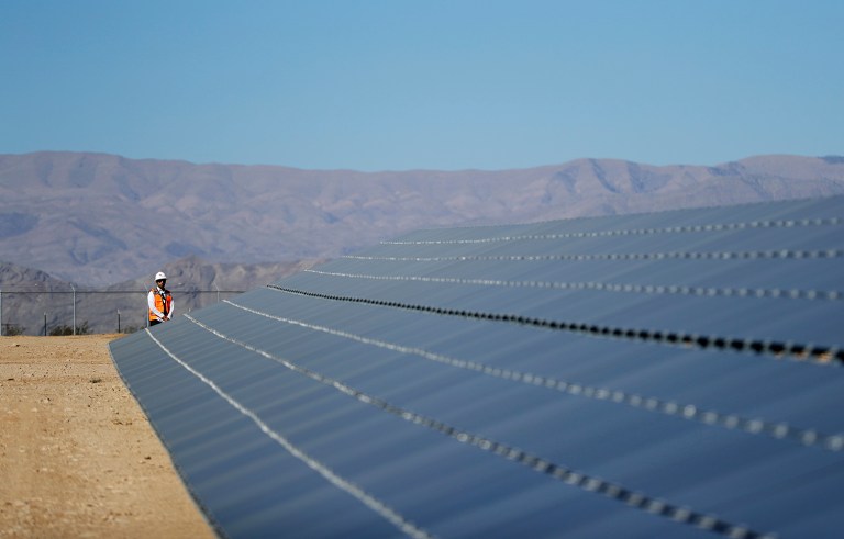 Congress excluded clean energy tax credits from a short-term spending bill that must pass by Friday. (AP Photo/John Locher)