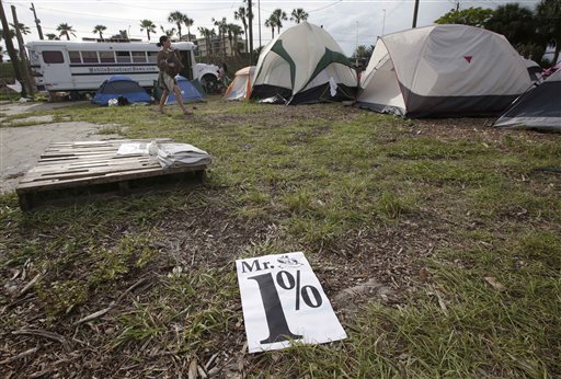 Protestors clean up what remains of 