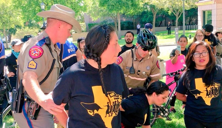 Four Deferred Action for Childhood Arrivals recipients and 11 others were arrested outside the Texas state Capitol Wednesday. (Twitter/@AntonioArellano)