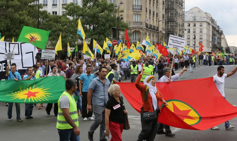Kurdish demonstrators staged a protest in Paris, Saturday Aug. 9, 2014, in support of  Kurds and Christians living in Iraq.  Tens of thousands of Iraqi Christians and ethnic minorities are facing potential slaughter by Islamist militants in Iraq. (AP Photo/Remy de la Mauviniere)