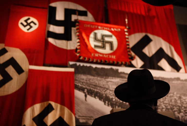 When several conferencegoers in the nation's capital flash unmistakable Nazi-style salutes, people just might get offended. (AP Photo/Kevin Frayer)