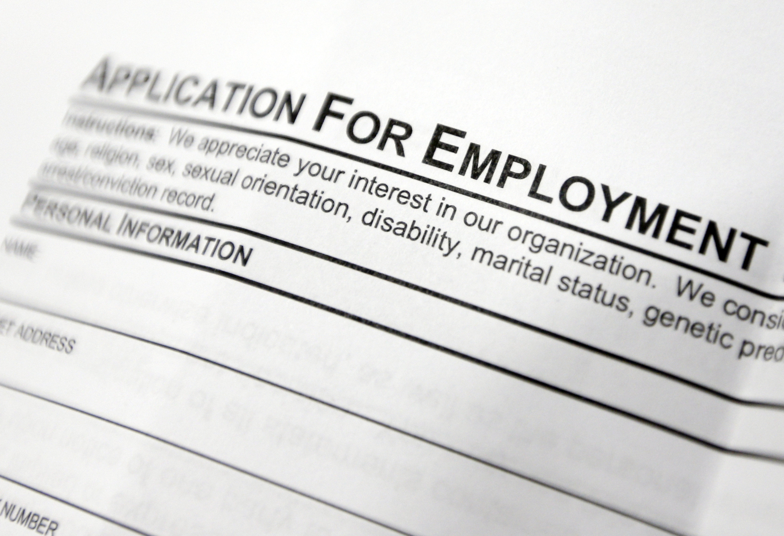 Jobless fall to historically low levels as economy brushes off omicron