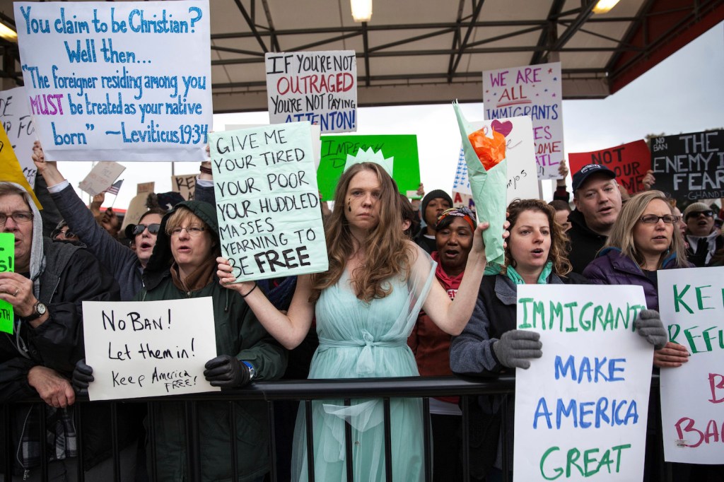 Four states sue Trump administration over refugee ban