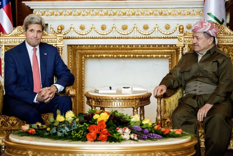 Kurdish regional President Massoud Barzani, right, listens to U.S. Secretary of State John Kerry during a meeting at the presidential palace in Irbil, Iraq, Tuesday, June 24, 2014. Kerry arrived in Iraq's Kurdish region in a US diplomatic drive aimed at preventing the country from splitting apart in the face of militants pushing towards Baghdad. (AP Photo/Brendan Smialowski, Pool)