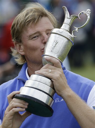 Ernie Els of South Africa kisses the Claret Jug trophy after winning the British Open Golf Championship at Royal Lytham & St Annes golf club, Lytham St Annes, England Sunday, July  22, 2012. (AP Photo/Chris Carlson)