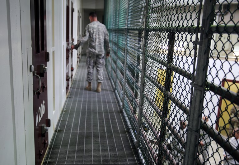 A provision in the annual defense policy bill passed last year requires the administration to tell Congress how it would close Guantanamo Bay and what it would do with the remaining inmates by Feb. 23. (AP Photo/Ben Fox)