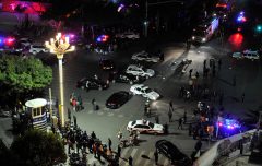 China puts 4 on trial for train station attack