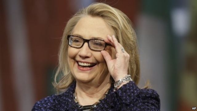Former Secretary of State Hillary Clinton adjusts her glasses during her career-capping international town hall meeting January 29. AP Photo