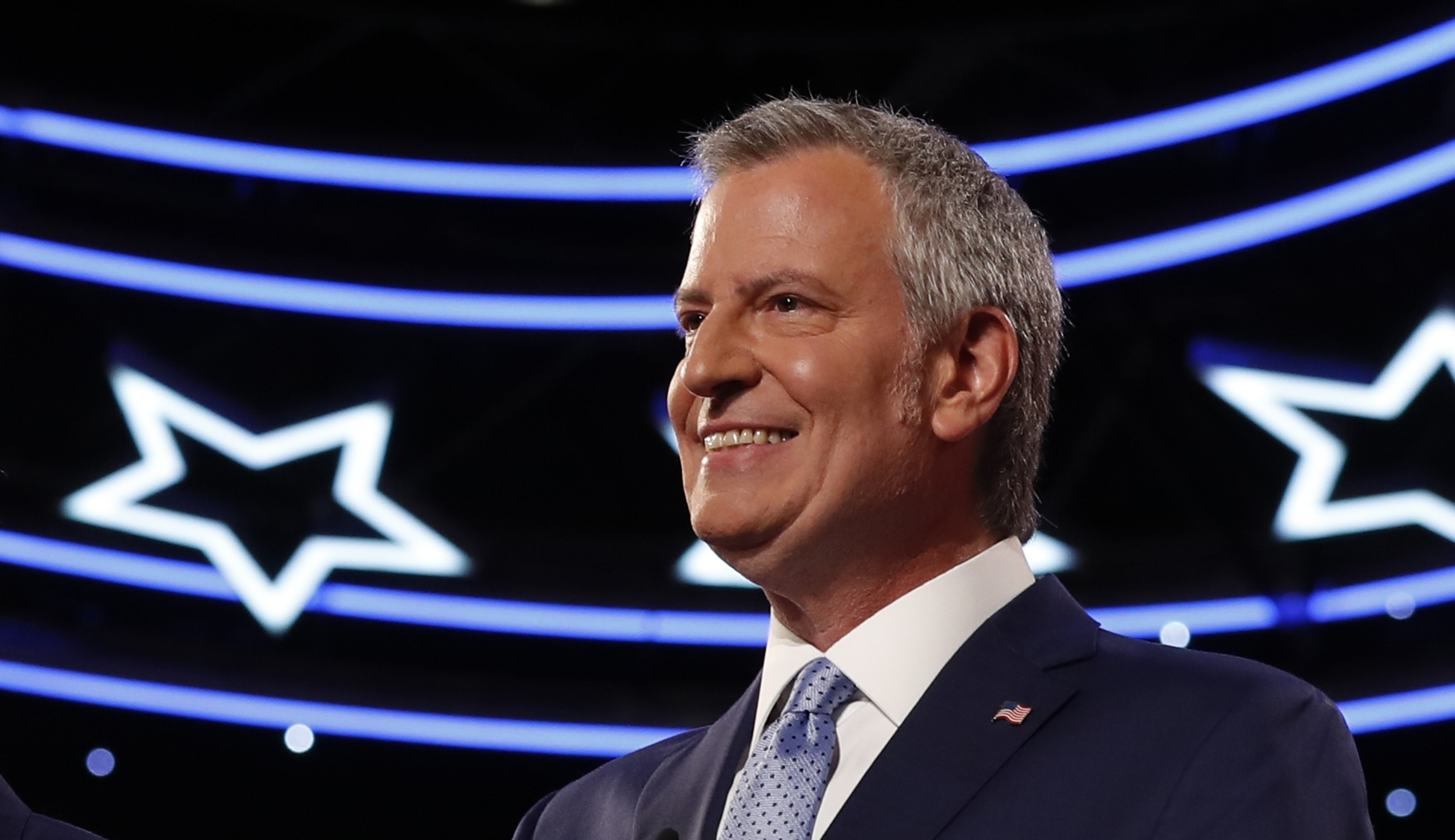 Bill de Blasio heckled during opening remarks at Democratic debate