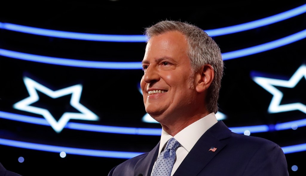 Bill de Blasio heckled during opening remarks at Democratic debate