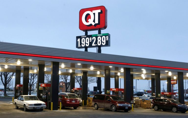 In this Friday, Dec. 19, 2014 file photo, motorists fill their tanks at a convenience store in Platt City, Mo., where prices dropped below $2-per-gallon for regular gas. Congressional Republicans are not ruling out raising the gas tax to keep afloat the broke Highway Trust Fund. (AP Photo/Orlin Wagner, File)