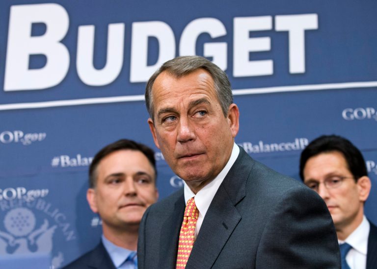   FILE - In this April 10, 2013, file photo House Speaker John Boehner of Ohio, flanked by House Majority Leader Eric Cantor of Va., right, and Rep. Luke Messer, R-Ind., meet with reporters after Republican strategy session on Capitol Hill, following the release of President Barack Obama's proposed fiscal 2014 federal budget. Boehner rejects accusations that he oversees a âdo-nothingâ House, though the Republican-led House has yet to resolve differences with the Senate over the federal budget, a farm bill, immigration and other big issues. (AP Photo/J. Scott Applewhite, File)  