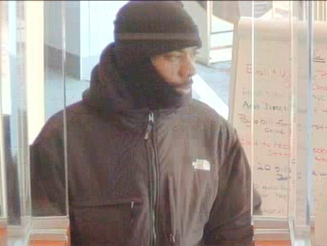 Authorities looking for armed serial bank robber