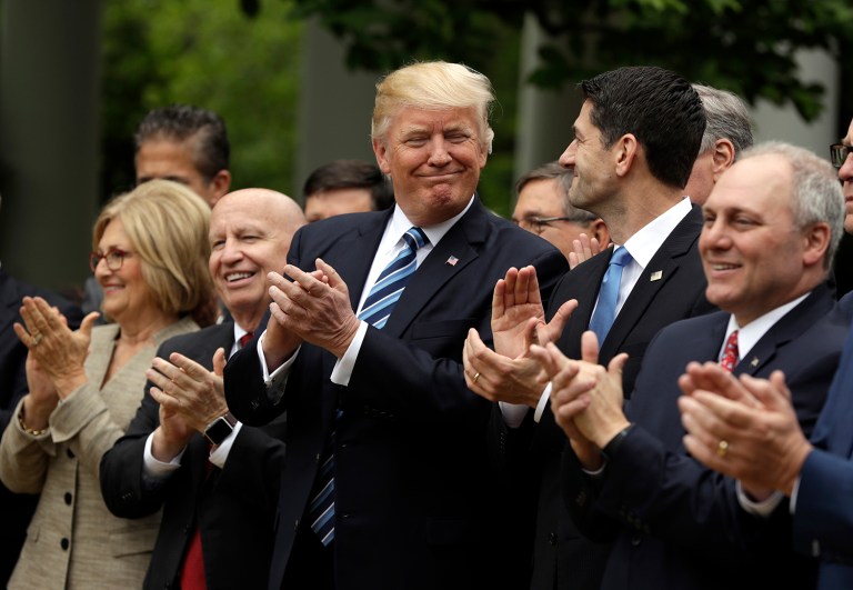 The theory is that by lowering tax revenue before embarking on tax reform, the less revenue has to be raised, making it politically much easier. (AP Photo/Evan Vucci)