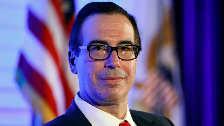 A big regional bank is set to be freed from Fed oversight Treasury Secretary Steve Mnuchin said that big businesses would be excluded from President Trump's planned low special business tax rate. (AP Photo/Alex Brandon)