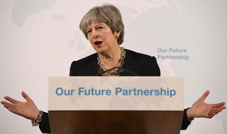 Britain's Prime Minister Theresa May delivers a speech at Mansion House, in London, Friday, March 2, 2018. May is promising to tell an impatient European Union on Friday what Britain is prepared to give and what it wants to take in a post-Brexit trade deal with the bloc.(Leon Neal/Pool Photo via AP)