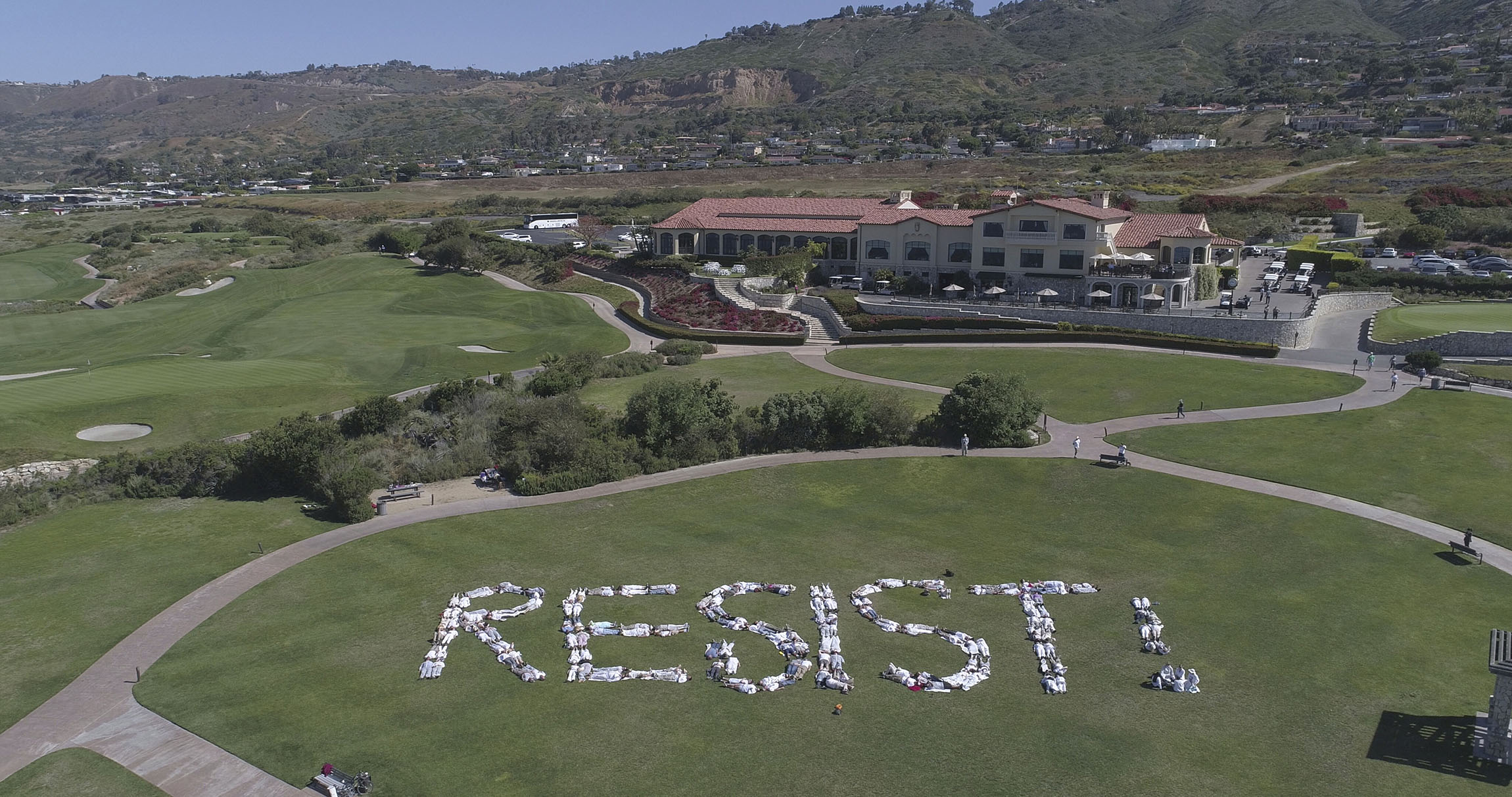 Protesters spell out ‘Resist!’ at Trump golf course in California