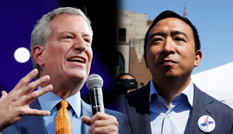 Bill de Blasio and Andrew Yang are seen.