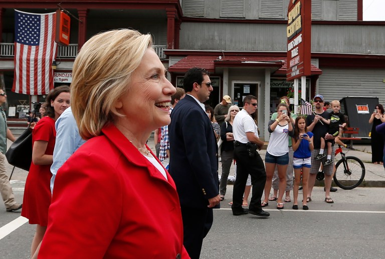 Democratic presidential candidate Hillary Rodham Clinton marches in a parade, Saturday, July 4, 2015, in Gorham, N.H. (AP Photo/Robert F. Bukaty)