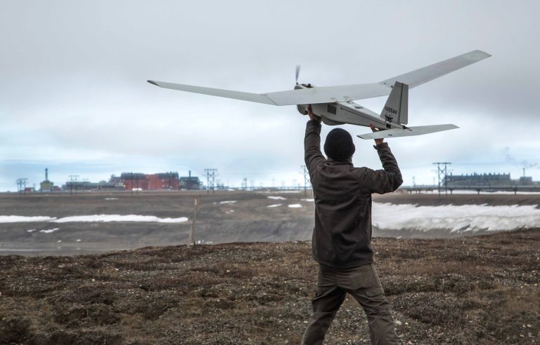 An AeroVironment Puma drone is given a pre-flight checkout in preparation for flights by BP at its Prudhoe Bay, Alaska operations, Saturday, June 7, 2014. (AP Photo/BP Alaska)