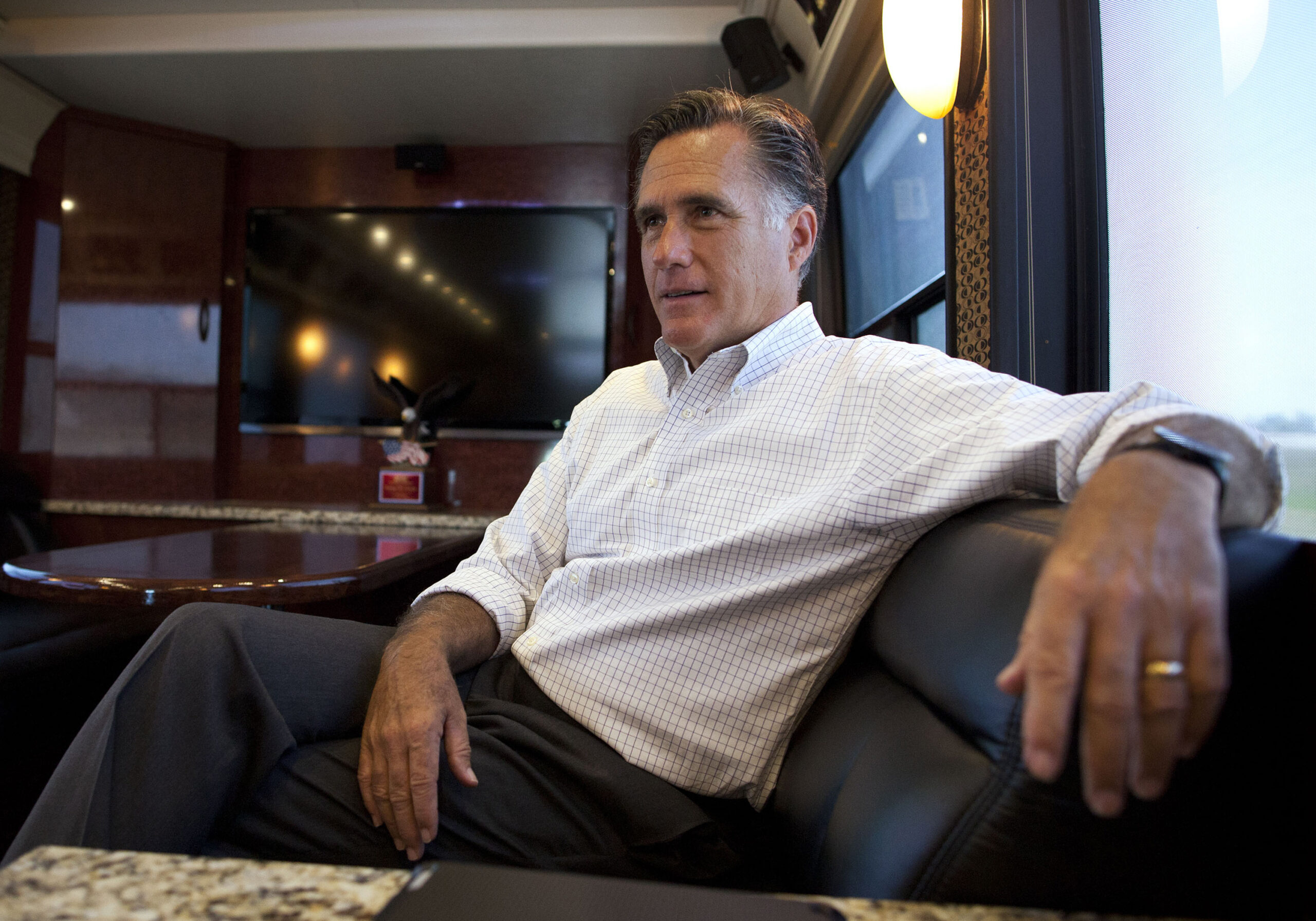 Romney keeps secrets _ unless law says he can’t