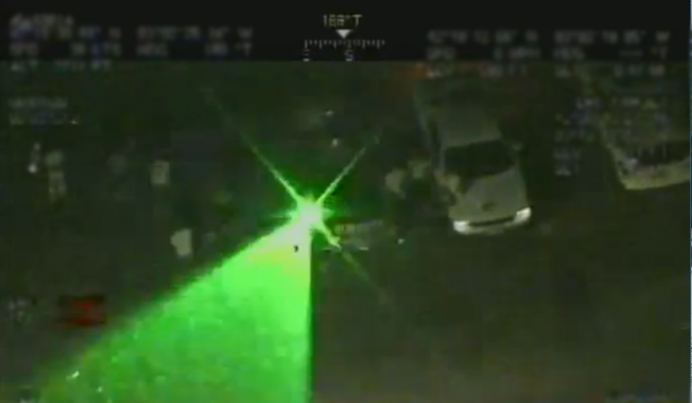 Federal police chopper flying over Detroit protests targeted in laser attack from Canada