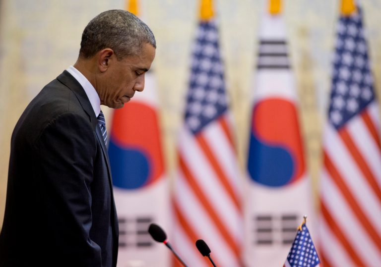 U.S. President Barack Obama pauses for a moment of silence for those who died in the ferry disaster as Obama and South Korean President Park Geun-hye, participate in the bilateral meetings at the Blue House, Friday, April 25, 2014, in Seoul, South Korea. (AP Photo/Carolyn Kaster)