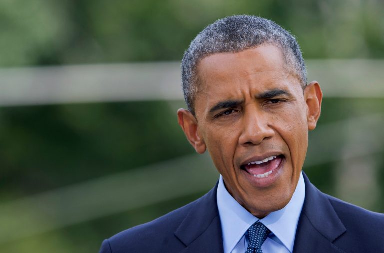 President Barack Obama speaks on the South Lawn of the White House in Washington, Tuesday, July 29, 2014, as he announces new economic sanctions against key sectors of the Russian economy in the latest move to force Russian President Vladimir Putin to end his support for Ukrainian rebels.  (AP Photo/Manuel Balce Ceneta)